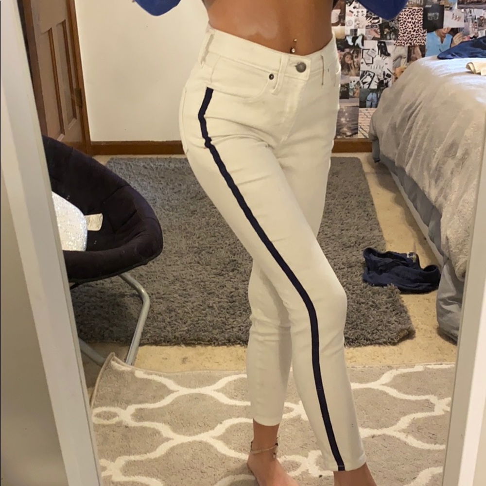 white jeans with navy blue stripes down the side